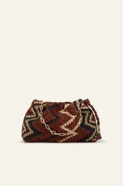 JUNE tribal-inspired raffia clutch