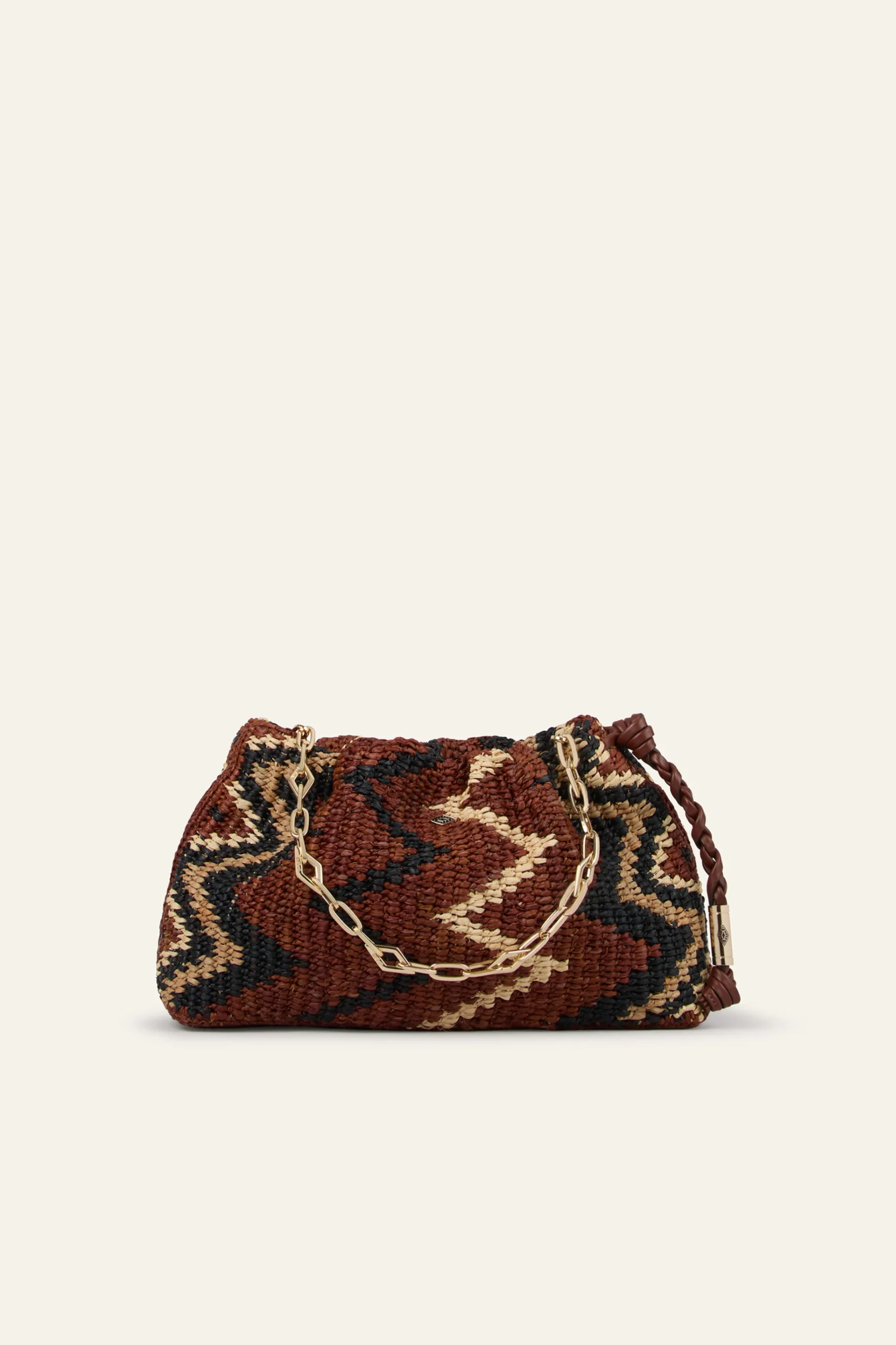 JUNE tribal-inspired raffia clutch