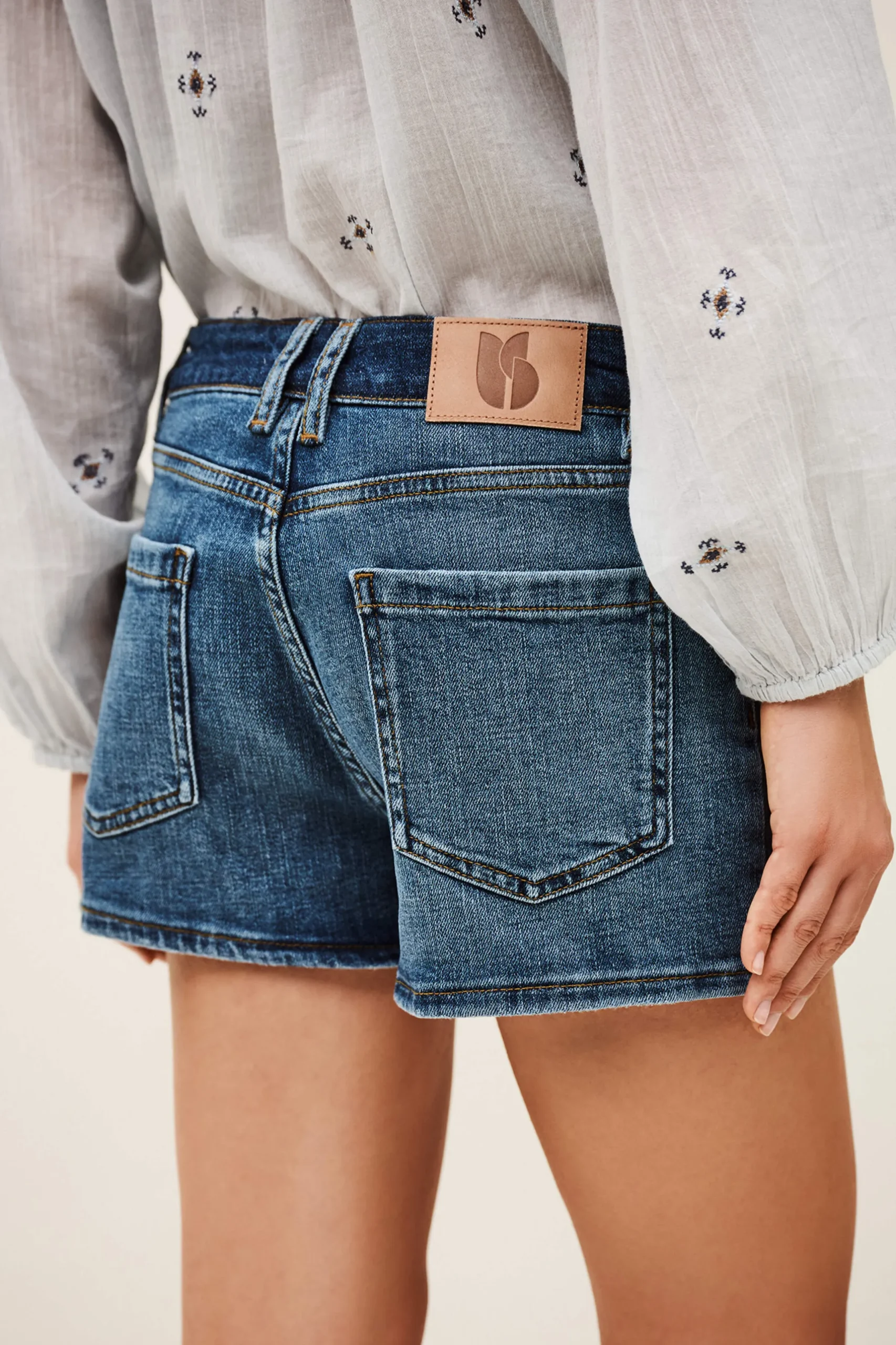 RIO high-waisted denim shorts