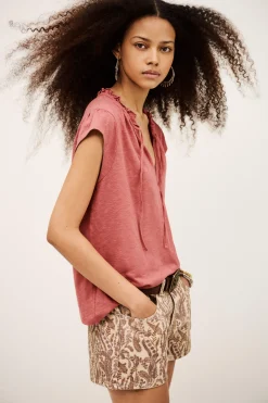 VERY top with ruffled sleeves