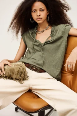VERY top with ruffled sleeves